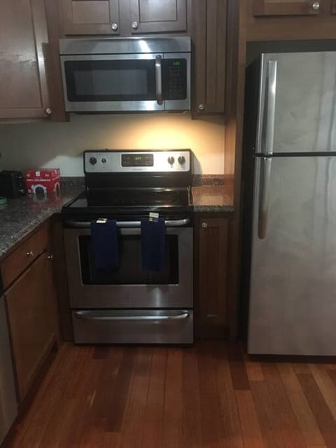 Fridge, coffee/tea maker, cookware/dishes/utensils