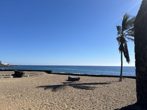 On the beach, sun loungers