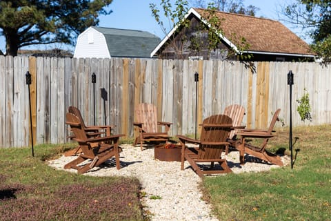 Patio for 6 with adirondack chairs and firepit