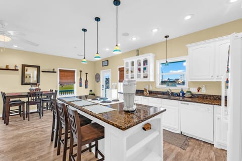 Gather around the island for morning coffee or evening drinks