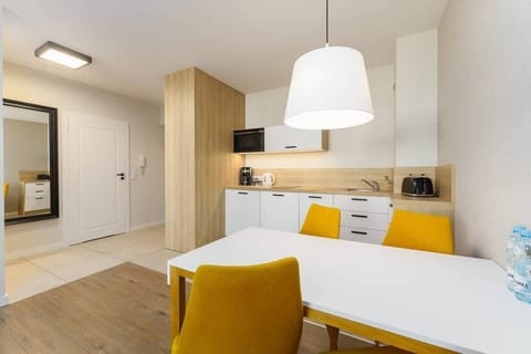 The kitchenette's practical layout maximizes space and functionality.