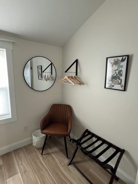 Bedroom with luggage rack and hangers