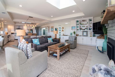 There is an open floor plan from the kitchen to the living room