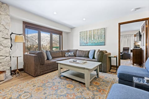 Bright inviting living area with fireplace