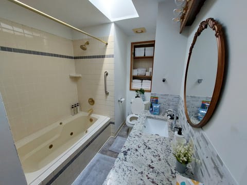 Jetted tub, hair dryer, towels, soap