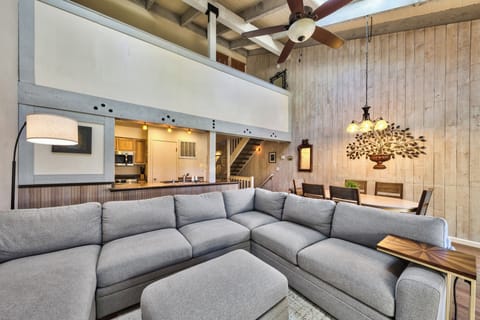 Natural light in the living area from sky lights and sliding glass door
