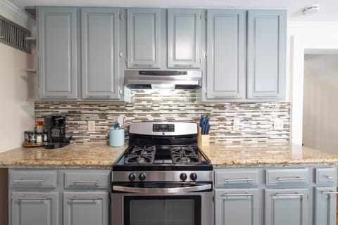 Kitchen. Sewing kit, first aid should be in top right cabinet.