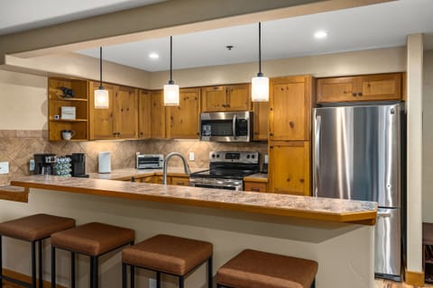 Seating for 4 at the breakfast bar!