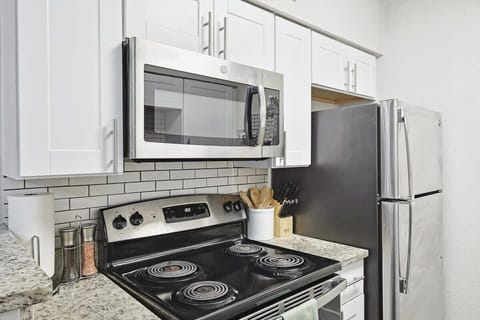 Fridge, oven, stovetop, cookware/dishes/utensils