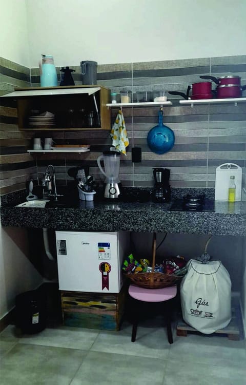 Fridge, stovetop, coffee/tea maker, electric kettle