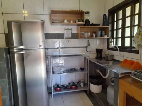 Fridge, stovetop, coffee/tea maker, electric kettle