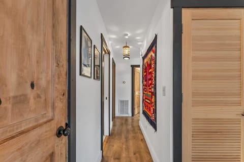 The view heading down the hallway leads to the tranquility of the bedrooms.