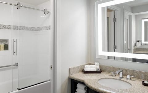 Full bathroom with a shower. Basic toiletries and towels are provided