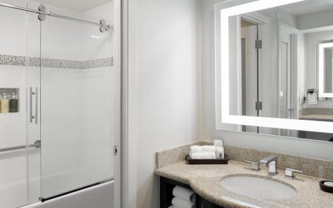 Full bathroom with a shower. Basic toiletries and towels are provided