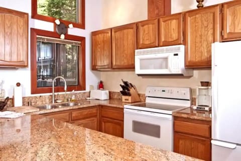 Kitchen with granite top counters