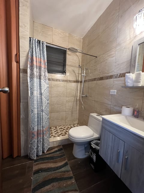 Combined shower/tub, hair dryer, towels, soap