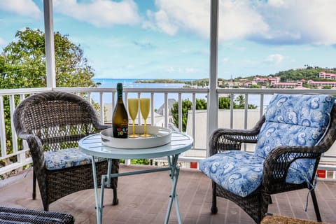 Private shaded patio has beautiful views of Christiansted Fort, Pier, and Beach
