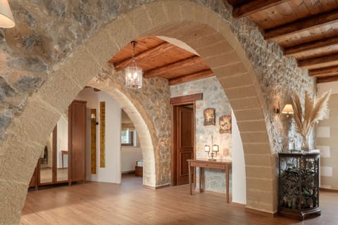 The living room is bright and filled with natural materials.