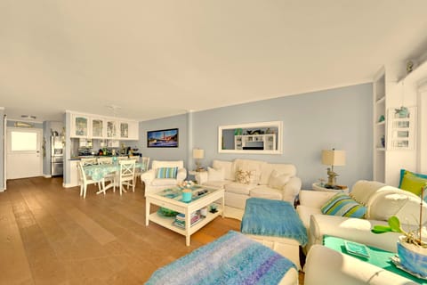 Family room with kitchen beyond