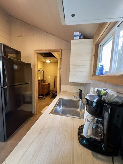 With Large fridge and microwave