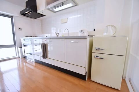 Fridge, microwave, cookware/dishes/utensils