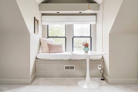 Primary Suite | Master bed, twin day bed, bistro table sitting area