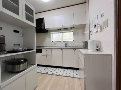 Fridge, microwave, cookware/dishes/utensils