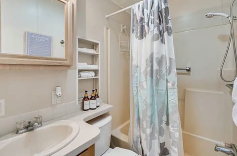 Combined shower/tub, hair dryer, towels, soap