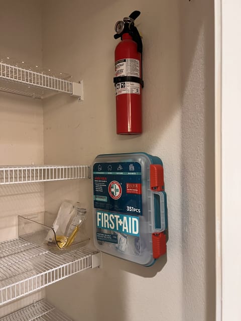 Fire Extinguisher and First aid kit in pantry