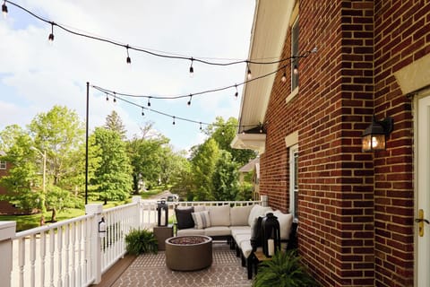 Upper deck w/ firepit and cafe lighting