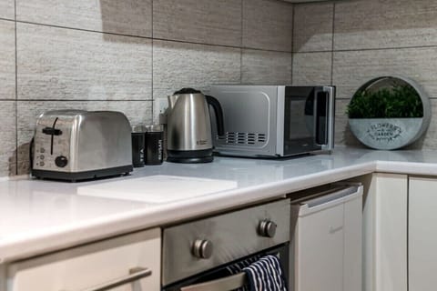 Fridge, oven, cookware/dishes/utensils