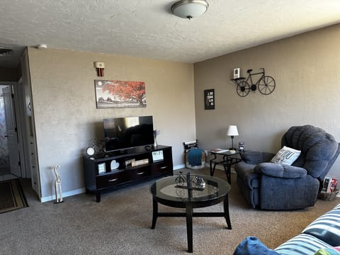 Large living room with a smart TV