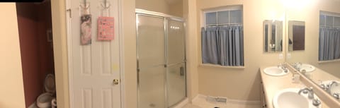 Combined shower/tub, hair dryer, towels, soap