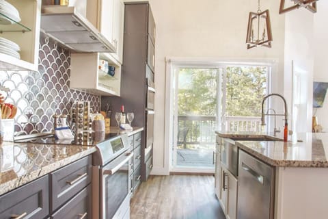 Fully stocked kitchen with access to deck