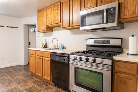 A fully equipped kitchen with modern appliances, ample counter space, and plenty of storage, providing everything you need for cooking and meal prep.