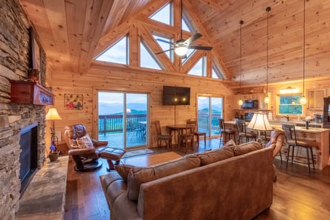 Livingroom - Living room with view of mountains through sliding glass doors and large windows