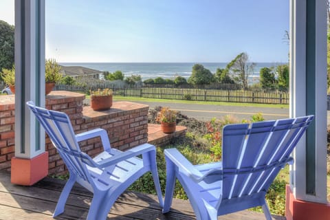 Breath in the ocean air on the porch with outdoor seating