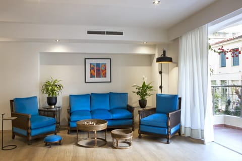 Living room with view to one of a few preservable buildings in the neighborhood.