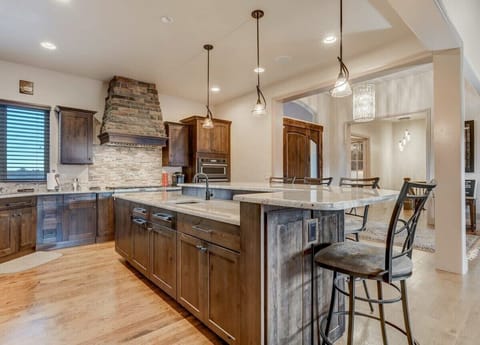 Discover the perfect fusion of style and functionality in our kitchen and wet bar – a harmonious blend for your stay.