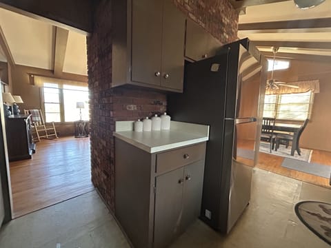 View from kitchen into living and dining areas