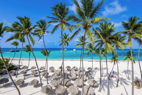 On the beach, sun loungers, beach towels