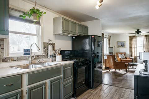 Fully equipped and kitchen; steps away from the living room