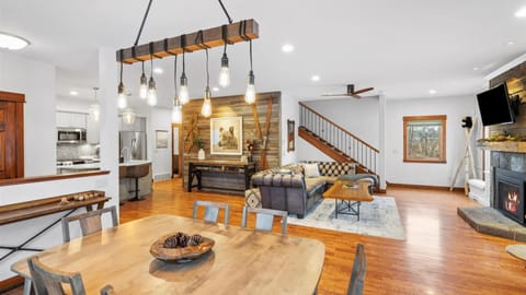 The dining area is neatly tucked into a window-surrounded enclave which provides gorgeous natural lighting throughout the day,