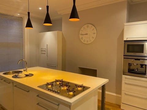 Kitchen with inbuilt coffee machine