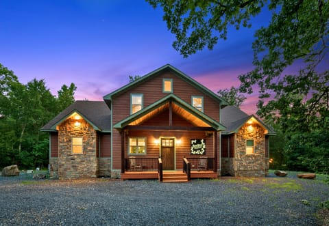 As the sun sets, the stunning twilight facade of Greenbriar transforms into a magical sight.