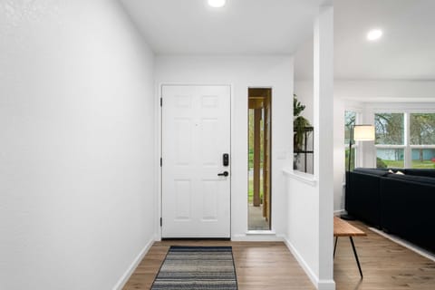 A hallway that greets you with warmth and convenience as you explore the rest of the home.