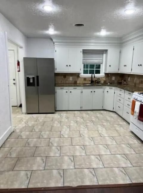 Stocked with basic needs-pots, pans, dishes, and utensils