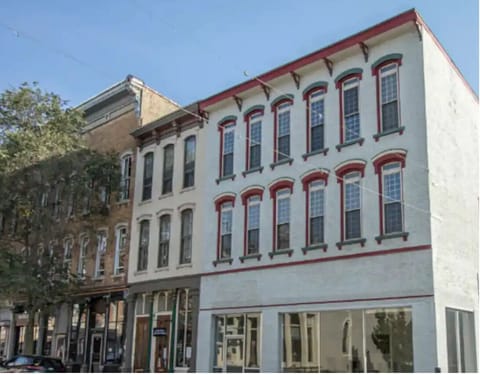 Exterior view of building. First floor is a candle shop!