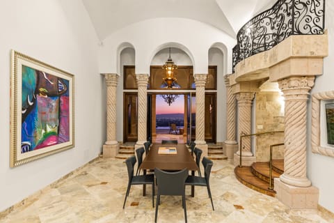 Formal dining area seating 8 people off kitchen w/ patio access