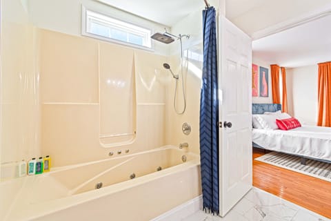 Combined shower/tub, hair dryer, towels, soap